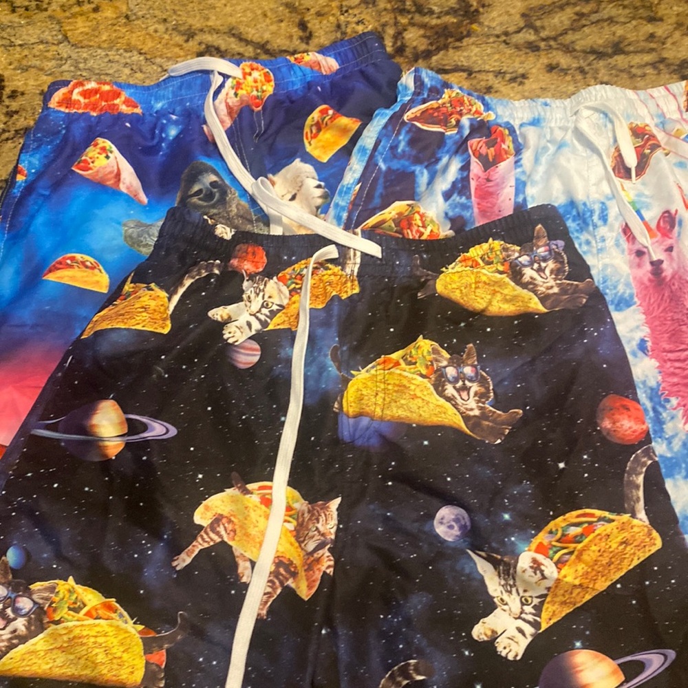 Three printed swimsuits